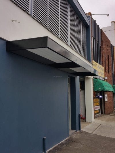 Slimline Awnings  - Black Frame  over a Door