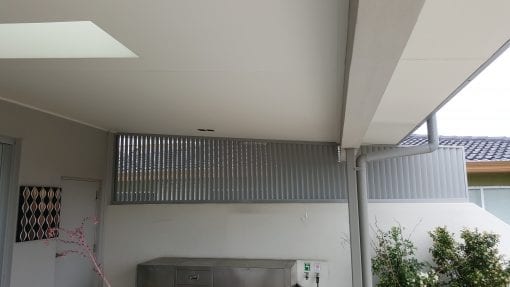 Privacy Screen Louvers  with fixed welded Louvers in a fixed frame running Vertically with a angled roof