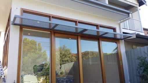 Canter Lever Louvers mounted above Glass door