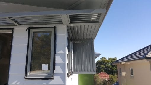 Canter Lever Louver  wrapped around a corner with a drop side privacy screen - Image 7