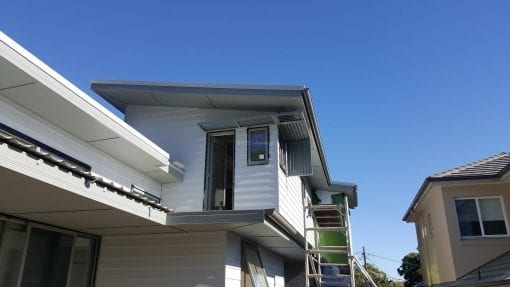 Canter Lever Louver  wrapped around a corner with a drop side privacy screen - Image 4
