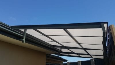 Retracta Roof Sliding Roof System 2 Bay 4 Panel with a fixed side patio attached