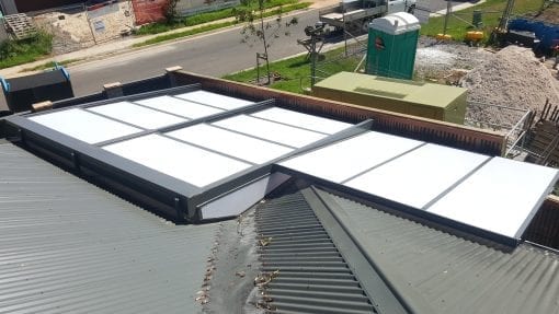 Retracta Roof Sliding Roof System 2 Bay 4 Panel with a fixed side patio attached - Image 2