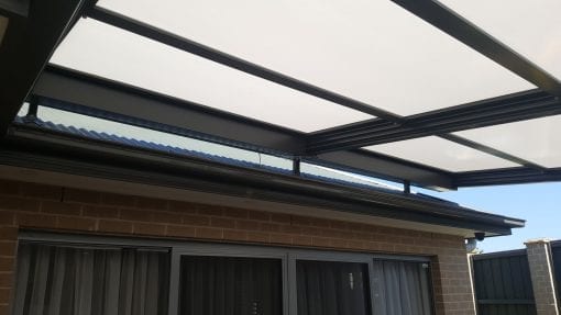 Retracta Roof Sliding Roof System 2 Bay 4 Panel with a fixed side patio attached - Image 9