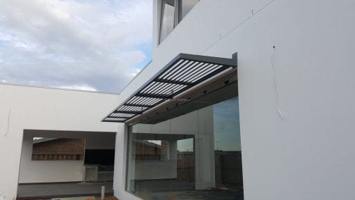 Canter Lever Louvers mounted above Glass door