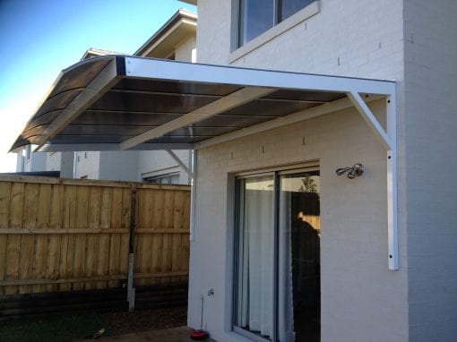 Canter Lever Twin wall Polycarb awnings with a bull nose - Image 9