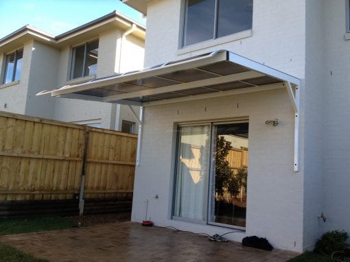 Canter Lever Twin wall Polycarb awnings with a bull nose
