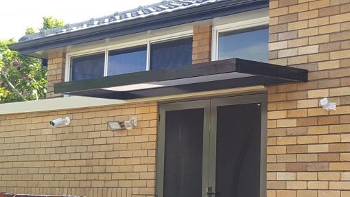 Slimline polycarb door awning