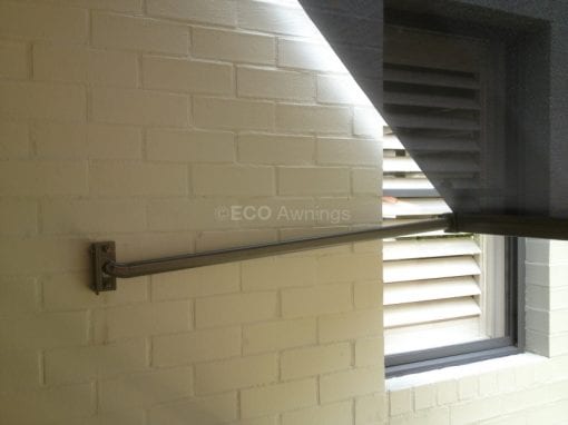 Pivot arm fabric awnings