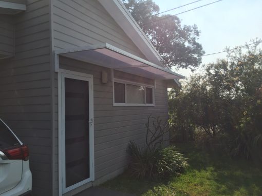 Slimline 50 Canter Lever awning with twin wall polycarb over a Door and window - Image 3