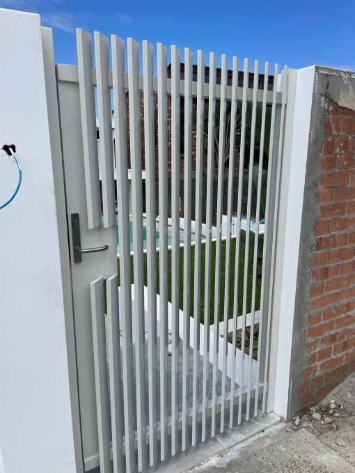 Angled Slat Fence and Gates - Image 2